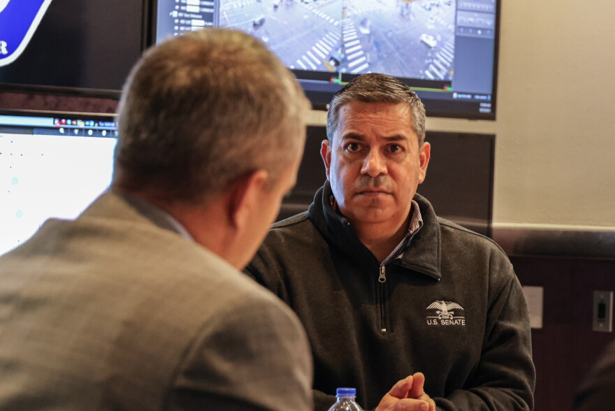 Senator Ben Ray Lujan listens as APD officials explain how the funding secured by the the Congressional Delegation have made improvements in Albuquerque's public safety