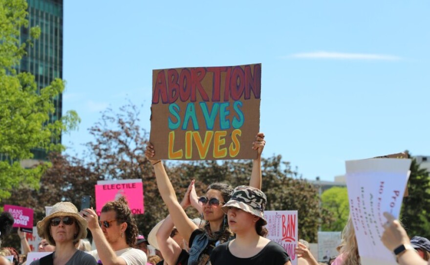 Demonstrators carried homemade signs at the rally in Downtown Cleveland.