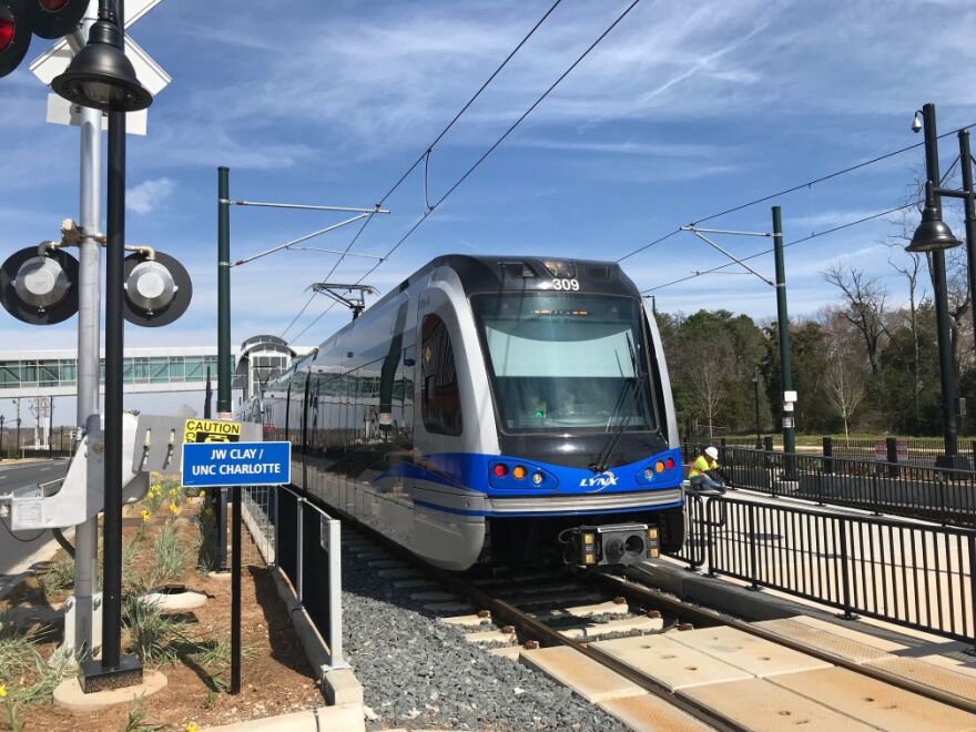 A light rail train at a station