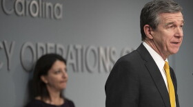 File photo of N.C. Governor Roy Cooper and N.C. Department of Health and Human Services Secretary Dr. Mandy Cohen.