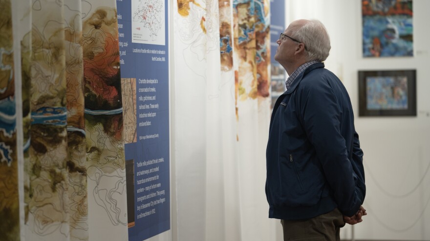  The “Climate Refugees in the City of Creeks” exhibit at the Levine Museum of the New South in Charlotte.