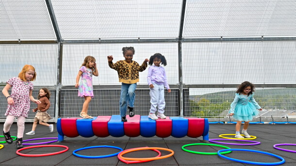Kindergarten students in the St. Clair Area School District play on the rooftop playground during recess.