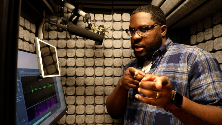 Voiceover artist Stefan Johnson in his home audio studio.