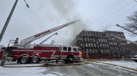 Dozens of firefighters from Holyoke and surrounding communities worked to put out a blaze at the corner of High and Franklin streets Tuesday, Dec. 2, 2025. It was the city's second fire in less than 24 hours, after flames ripped through another apartment building on Clemente Street. At least 60 families were believed to have been displaced, officials say, adding that no injuries have been reported.