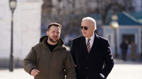 US President Joe Biden (R) walks next to Ukrainian President Volodymyr Zelensky (L) as he arrives for a visit in Kyiv.