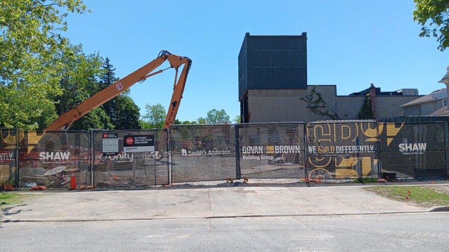 Construction vehicle at a construction site for demolition of Royal George Theatre