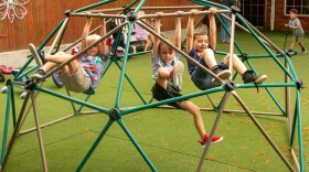 The all-day, intergenerational pre-K class in Guthrie plays outside during recess.