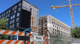 The first phase of the Next Generation Housing Development Plan, under construction on July 8, 2026, is set to be completed in Fall 2027.