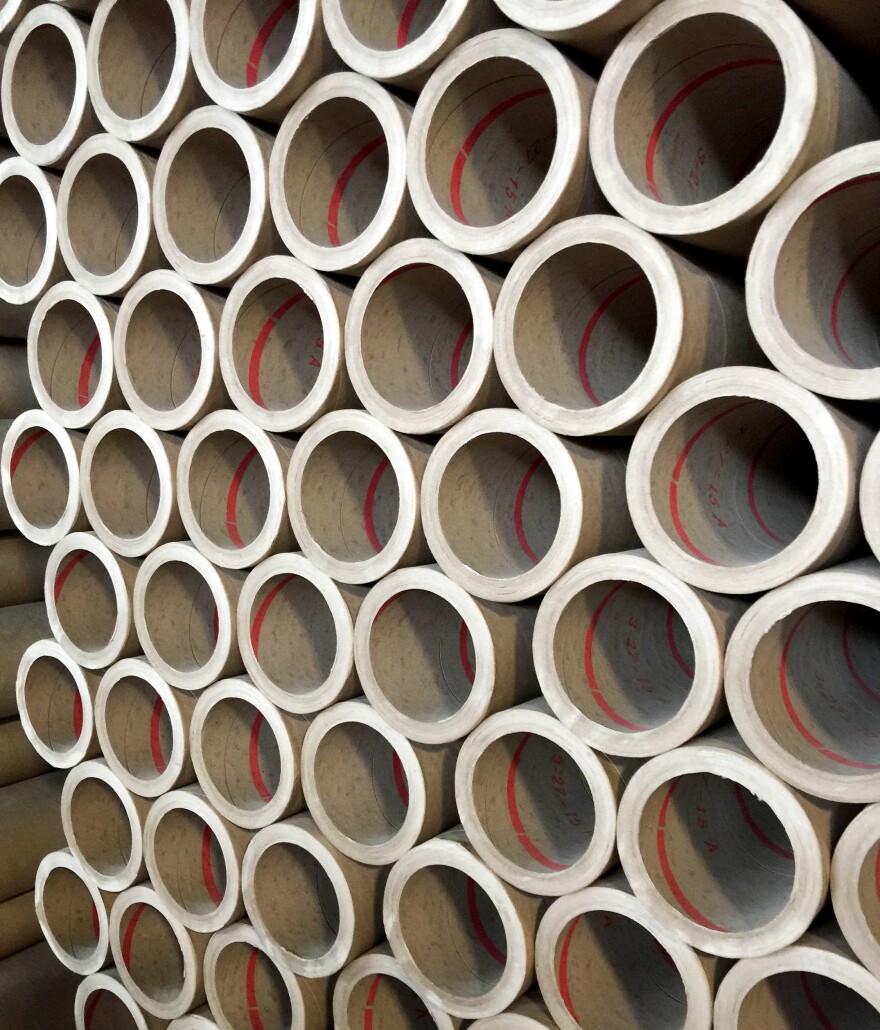Giant rolls of paper stacked at the Sonoco Paper Mill, which is then used to make containers for products such as Pringles potato chips or Planters peanuts.