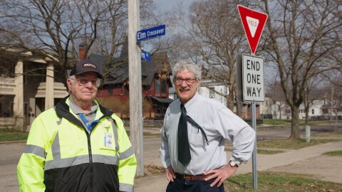 Kalamazoo Traffic Engineer Dennis Randolph and Kalamazoo resident James Voigt stand at the instersection of Elm Crossover and Elm Street