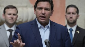 Gov. Ron DeSantis speaks during a news conference, Feb. 1, 2022, in Miami. 