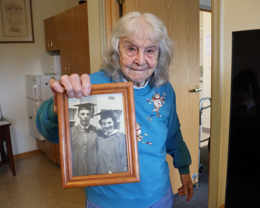 Florabelle Rice holds a photo of her and her husband, George, taken at their graduation from Western Washington University. Photographed Feb. 10, 2026.