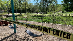 Caution tape cordons off a swing set at Bryan Park in Bloomington amid the coronavirus pandemic.