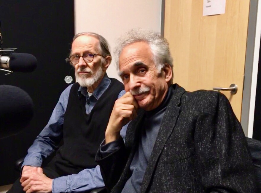 Underground cartoonist R. Crumb and Penn State Professor Jerry Zolten sitting in the WPSU studio