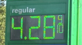 The sign at a gas station on Western Avenue in Peoria displays the price for regular gasoline as $4.28 and 9/10 cents per gallon on Tuesday, Sept. 1.