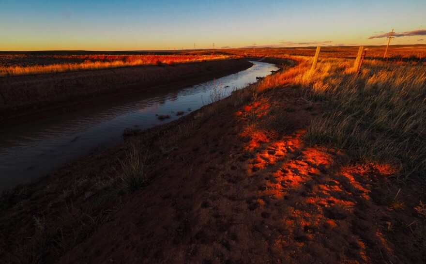 Water from McPhee Reservoir flows through a canal near Pleasant View, Colorado on its way to Dove Creek, Colorado on October 27, 2021.