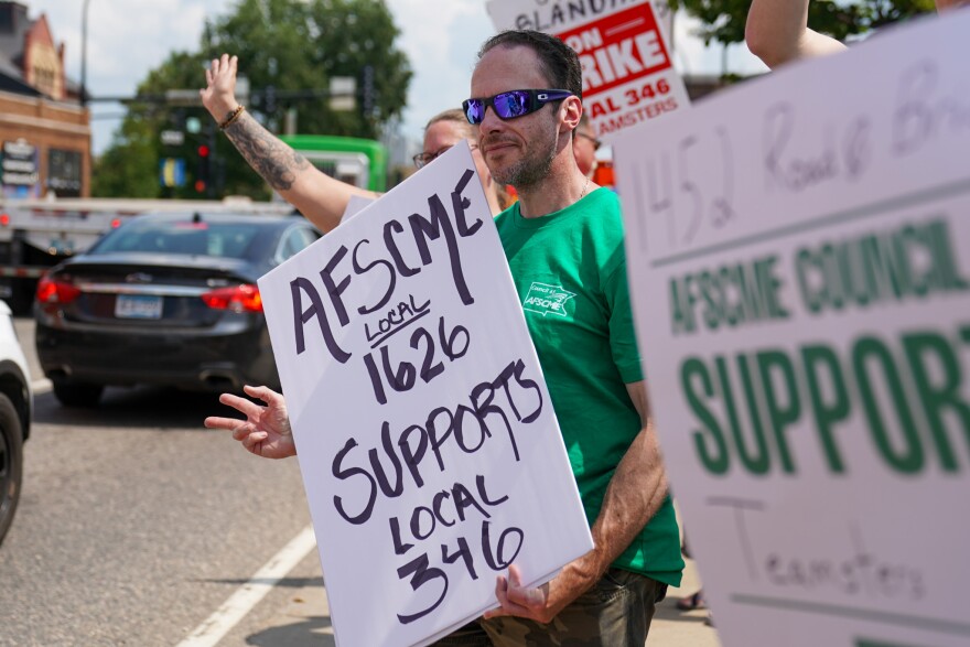 Christopher Worth, president of AFSCME Local No. 1626 representing Itasca County Courthouse employees, stands in solidarity with striking UPM Blandin paper mill workers Friday, July 21, 2023, in Grand Rapids, Minnesota.