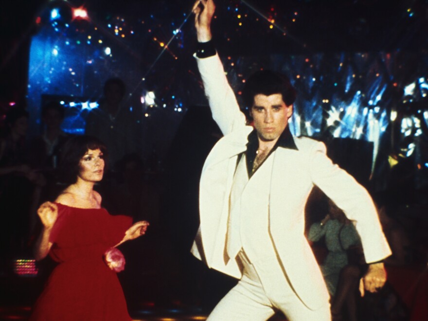 John Travolta dances the night away in "Saturday Night Fever."