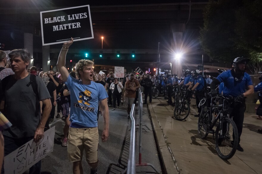 A "white allies" protest descended on Busch Stadium Thursday, Sept. 21, 2017, during a Billy Joel concert to protest the acquittal of ex-police officer Jason Stockley on murder charges.