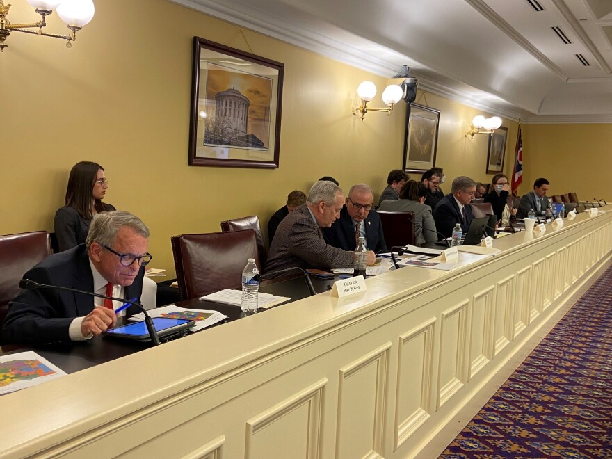 The five Republicans on the Ohio Redistricting Commission - Gov. Mike DeWine, Auditor Keith Faber, Senate President Matt Huffman, Speaker Bob Cupp and Secretary of State Frank LaRose - look at draft maps before the Commission's meeting on Sunday, March 27, 2022.