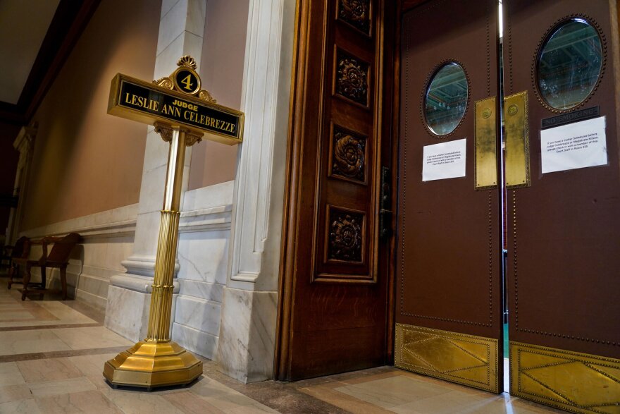 A black and gold plaque reads: “Judge Leslie Ann Celebrezze.”