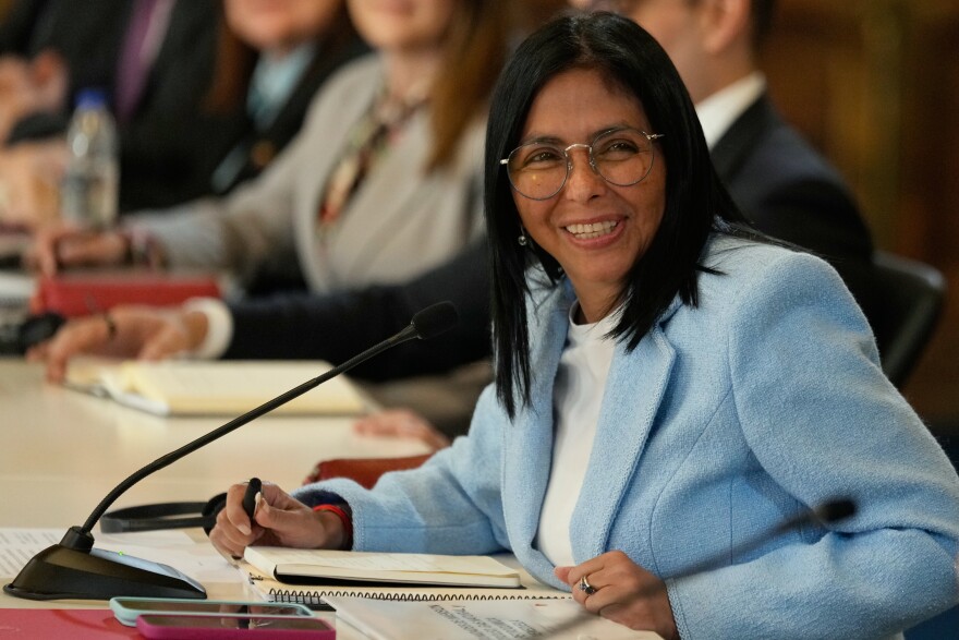 FILE - Venezuela's acting President Delcy Rodriguez smiles during a meeting with a delegation led by U.S. Energy Secretary Chris Wright at Miraflores Palace in Caracas, Venezuela, Feb. 11, 2026. (AP Photo/Ariana Cubillos, File)