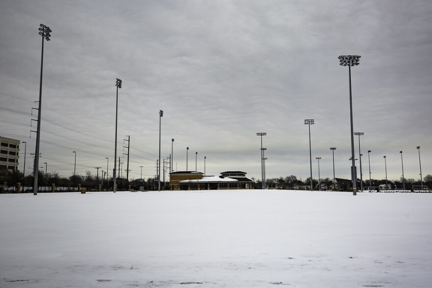  Snow covers an intramural field in the North Loop neighborhood of Austin after a winter storm in February. 