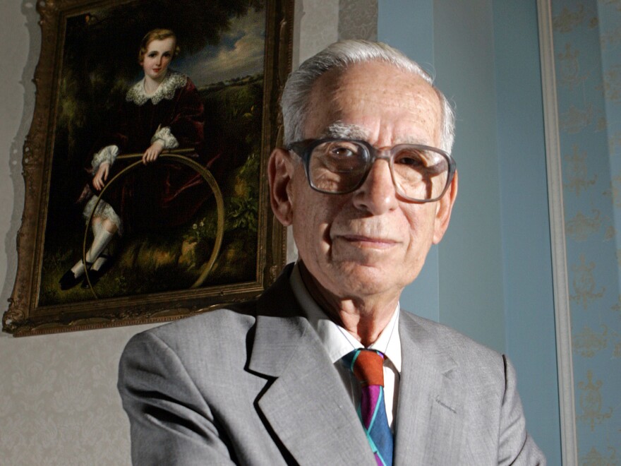 Claude Cassirer of San Diego poses in the entrance to his condominium in 2005. Cassirer died in 2010.