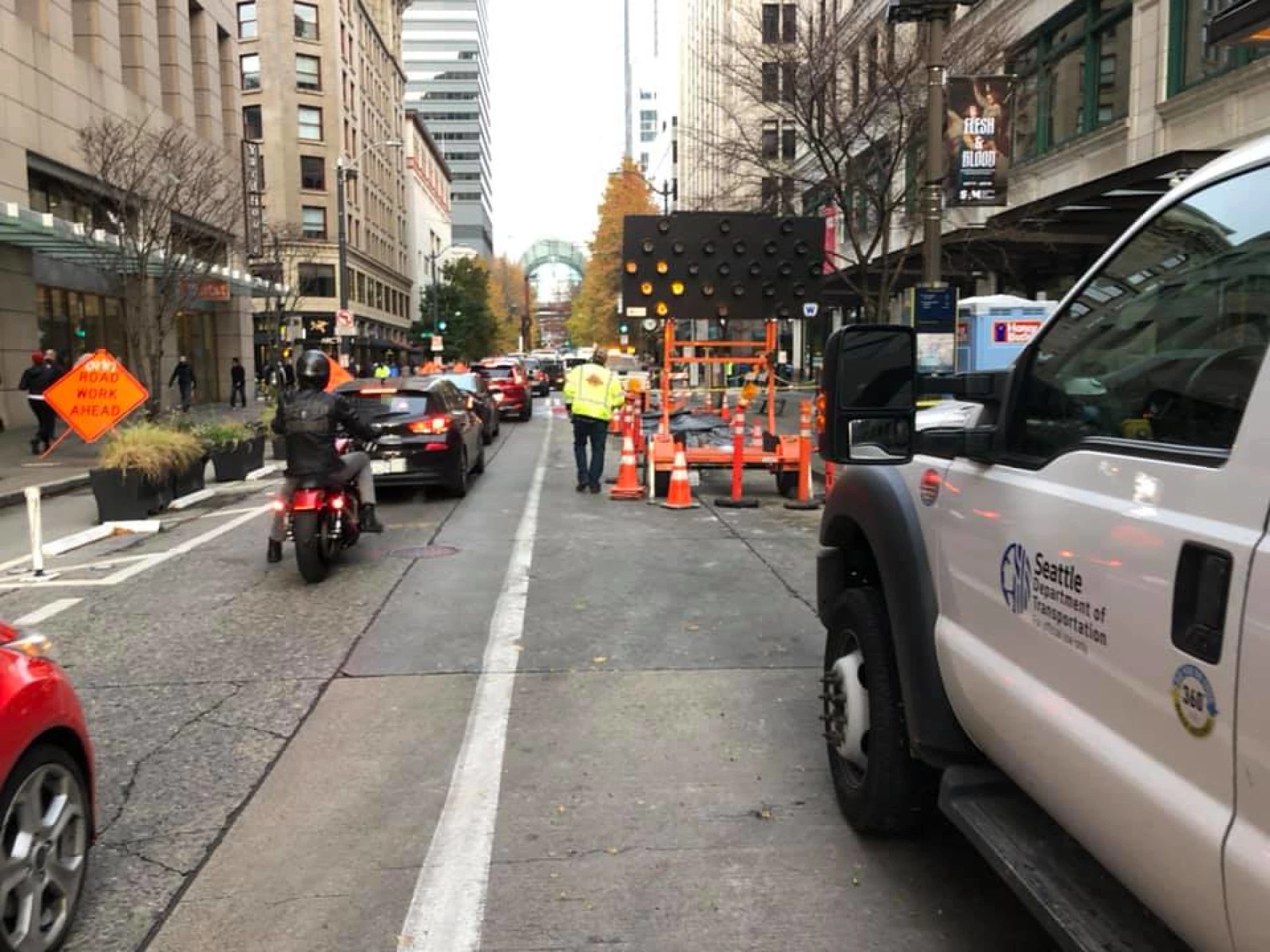 Seattle Department of Transportation crews work on a weekend at Pike St and 4th Ave in downtown Seattle.