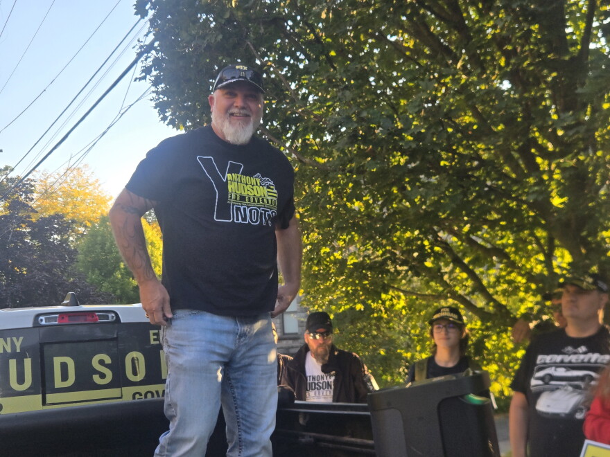 Libertarian Party gubernatorial nominee Anthony Hudson held a small protest outside the WOOD-TV studio in Grand Rapids over not being invited to the gubernatorial debate.