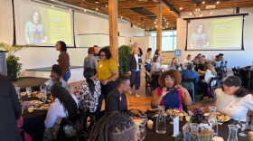 Supporters celebrate Rockstar Woman Movement's and Grow's Build With Us announcement.