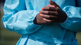 A nurse in personal protective equipment (Yasuyoshi Chiba/AFP/Getty Images)