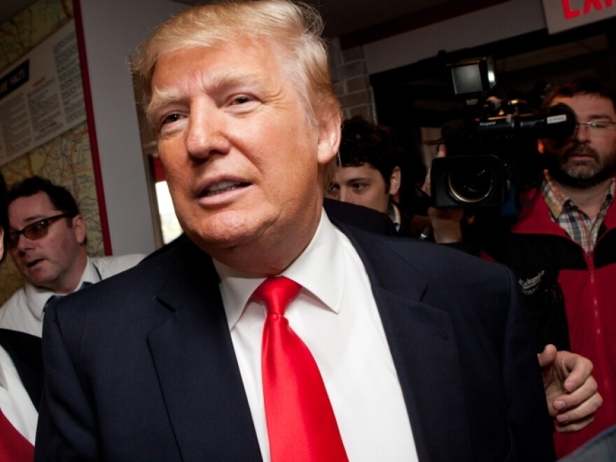 Donald Trump arrives at the Roundabout Diner in New Hampshire. Trump has questioned President Obama's status as a citizen of the U.S. He was answered this morning when the Obama administration released the President's birth certificate.
