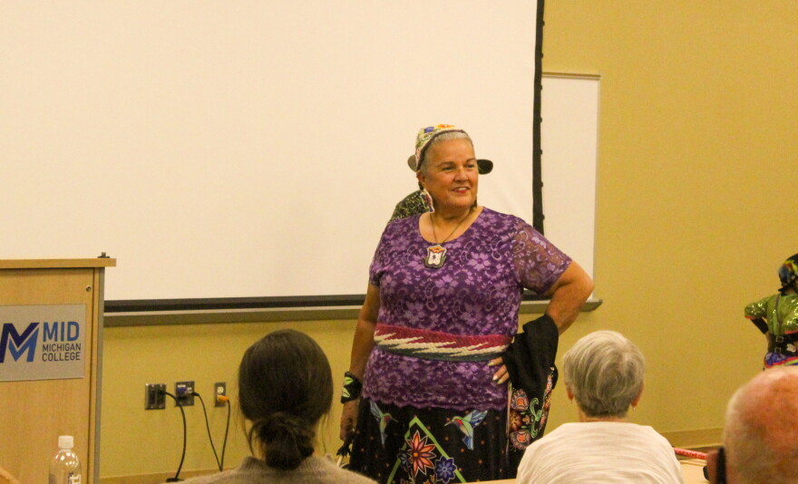 Judy Pamp, an Indigenous Educator, performs a Native American traditional dance at Mid-Michigan College, Mount Pleasant campus, on Oct. 12, 2026.