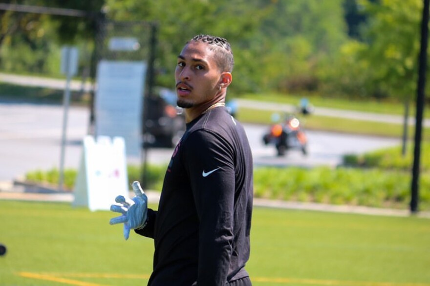 A man at football practice.