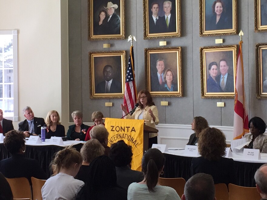 Garnett Stokes speaking at the Zonta Club of Tallahassee