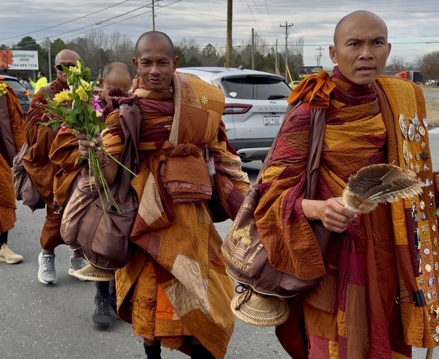 Buddhist monks cross the North Carolina-South Carolina state line Wednesday, Jan. 14, 2026.