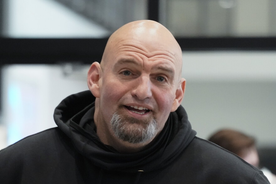 Pennsylvania Lt. Gov. John Fetterman visits with people attending a Democratic Party event for candidates to meet and collect signatures for ballot petitions for the upcoming Pennsylvania primary election, at the Steamfitters Technology Center in Harmony, Pa.