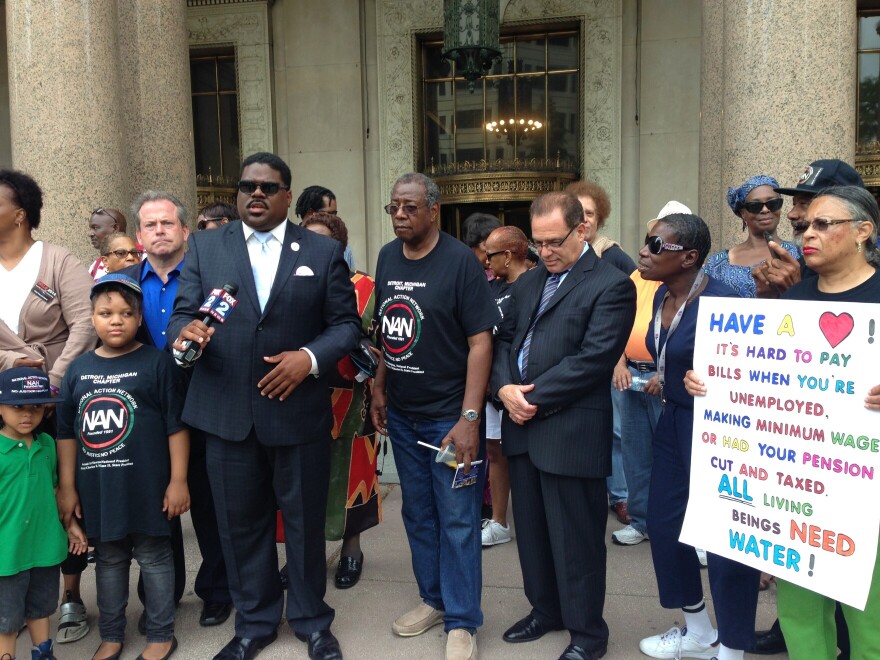 Protesters voiced their anger over the controversial water shut-offs in Detroit in 2014.