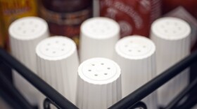 Most Americans eat far more salt than they should, exceeding the dietary guidelines for sodium. (Cliff Owen/AP)