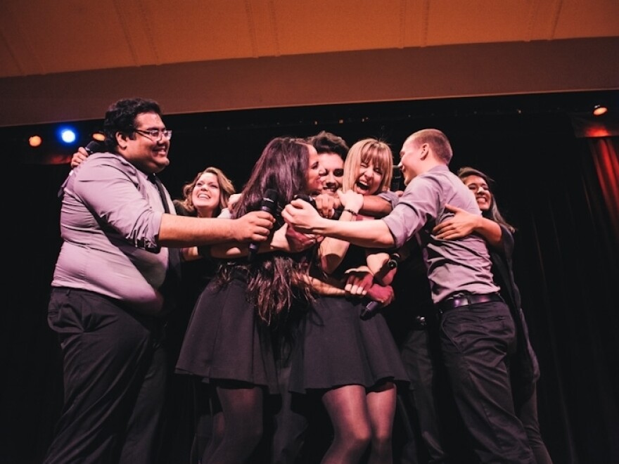 The Northeastern University Nor'easters celebrate after winning at the ICCA finals.