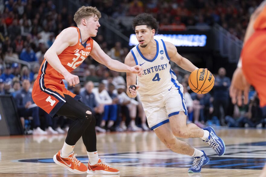 Kentucky guard Koby Brea (4) handles the ball against Illinois guard Kasparas Jakucionis (32) during the first half in the second round of the NCAA college basketball tournament, Sunday, March 23, 2025, in Milwaukee. (AP Photo/Kayla Wolf)