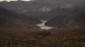FILE - Water flows down the Colorado River downriver from Hoover Dam in northwest Arizona, on Aug. 14, 2022, near the Lake Mead National Recreation Area. More than 10% of the water carried by the Colorado River evaporates, leaks or spills as the 1,450-mile powerhouse river of the West flows through the region’s dams, reservoirs and open-air canals.