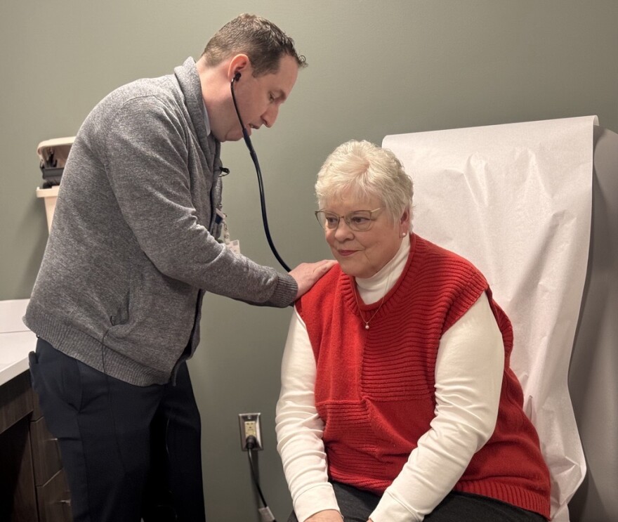 Dr. Scott Feitell, director of heart failure for Rochester General, performs a lung and heart exam on Carol Boyer. Boyer was diagnosed with amyloidosis after a biopsy on her right hand was positive for amyloids.