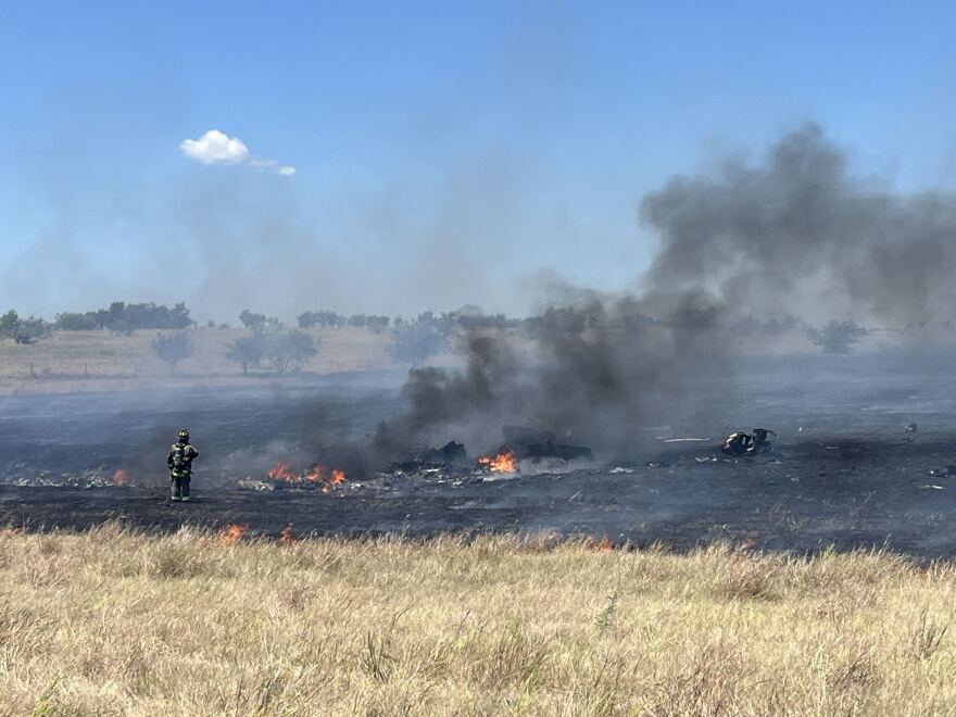 A grass fire burned in Salado after a Fort Hood helicopter crashed, killing two, on Wednesday.