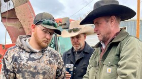 Rancher Lamont Herman discusses his tractor problems on the ranch in St. Xavier