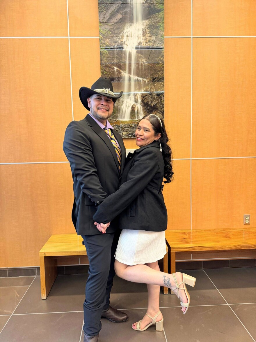 Alex Sanchez-Ramos and Sonia Espinoza Arriaga stand in the Kenai Courthouse on their wedding day on Thursday, Feb. 5, 2026 in Kenai, Alaska.