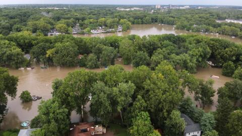 This aerial photo provided by the Indianapolis Fire Department shows flooding in northern Indianapolis, Indiana, Saturday, Aug. 15, 2026. (Indianapolis Fire Department via AP)
