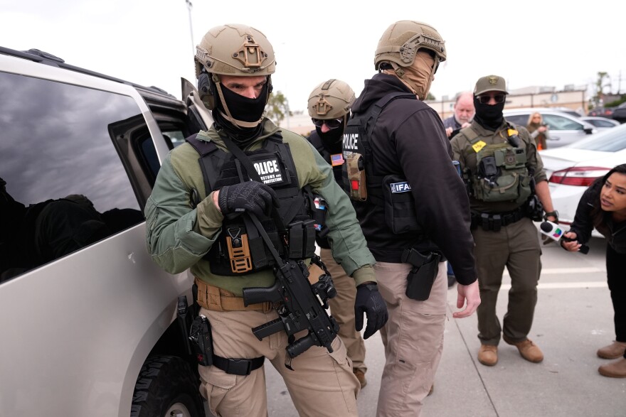 U.S. Border Patrol agents arrive at a Home Depot in Kenner, La., Wednesday, Dec. 3, 2025. 