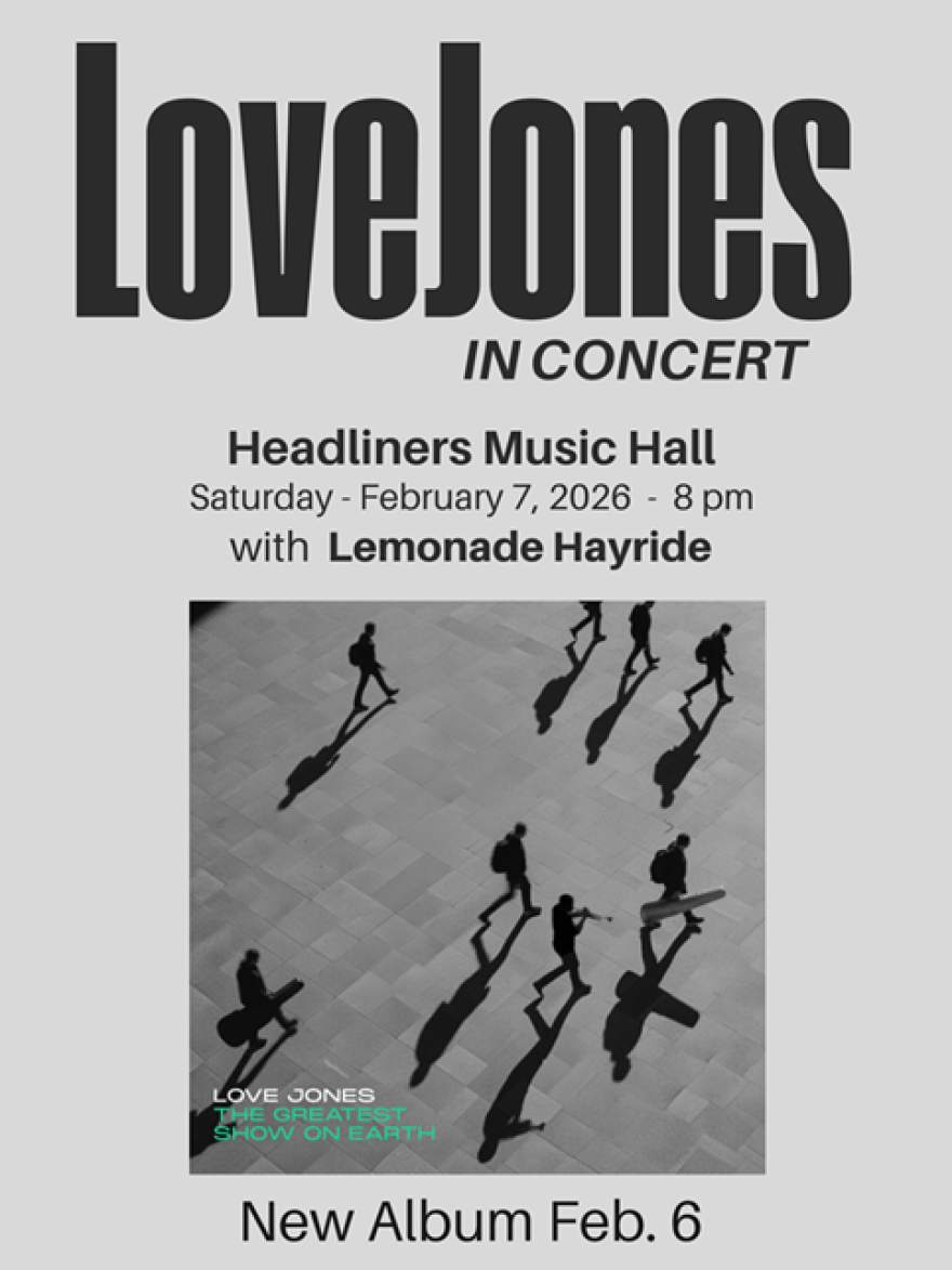 The band is photographed from above carrying their instruments.